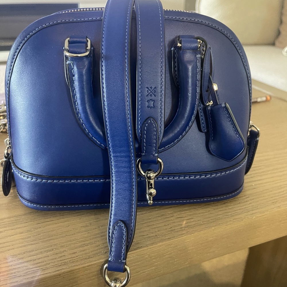 SOLD……Coach Revel 24
